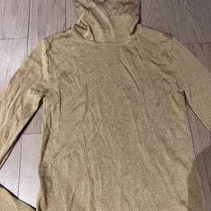 Sparkly gold turtleneck